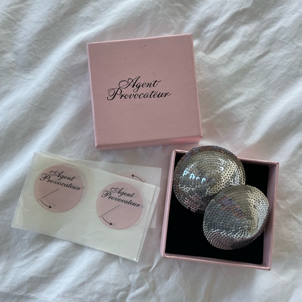 Agent provocateur silver pasties with pink leather lining